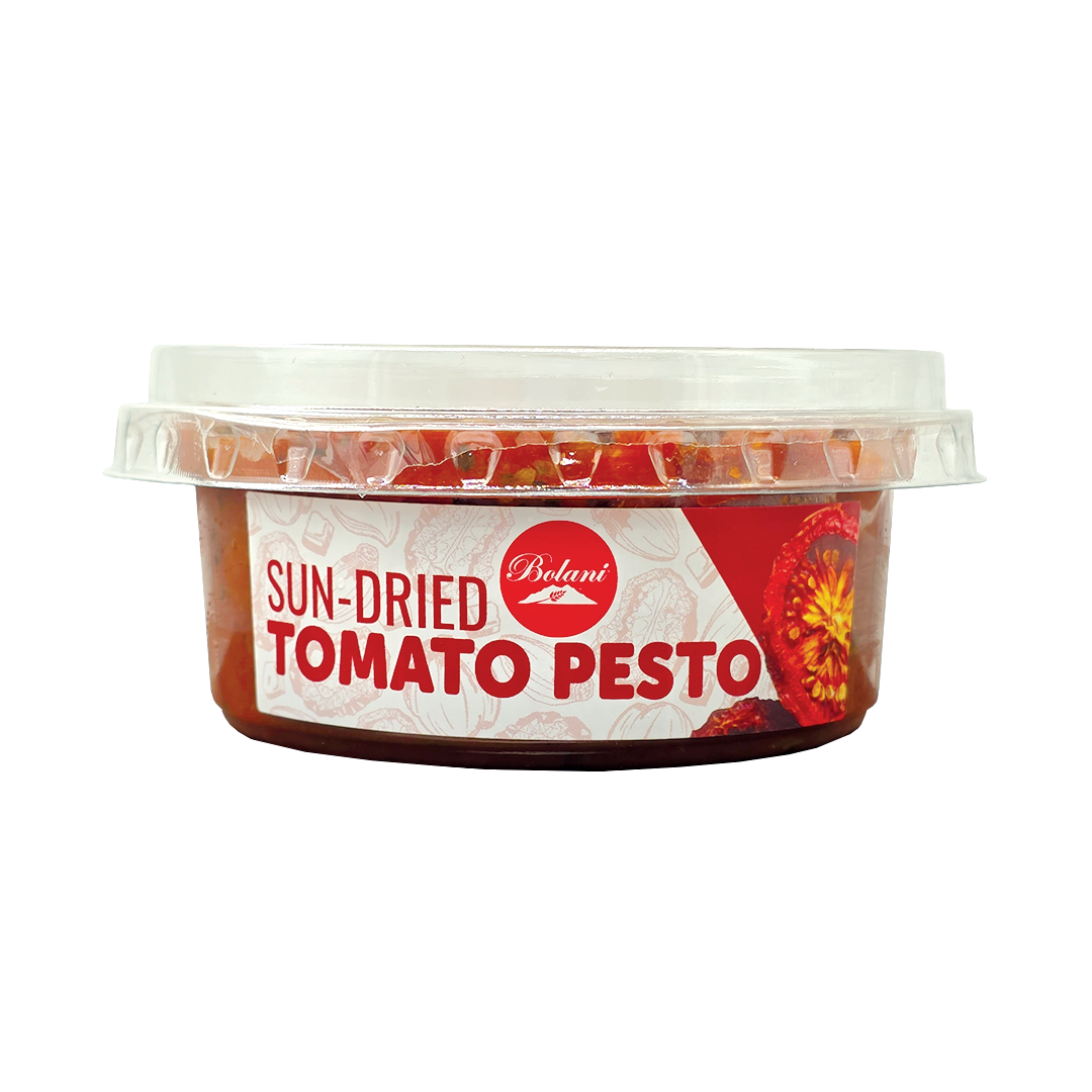Side view of a Bolani Sun-Dried Tomato Pesto container.